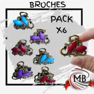 Pack x6 broches de metal labrado diseño pavo real con piedras color rubí, azul y violeta. Accesorios mayoristas en Argentina con despacho en 48hs. Precios directos de fábrica a través de MB Comercializa para revendedores.